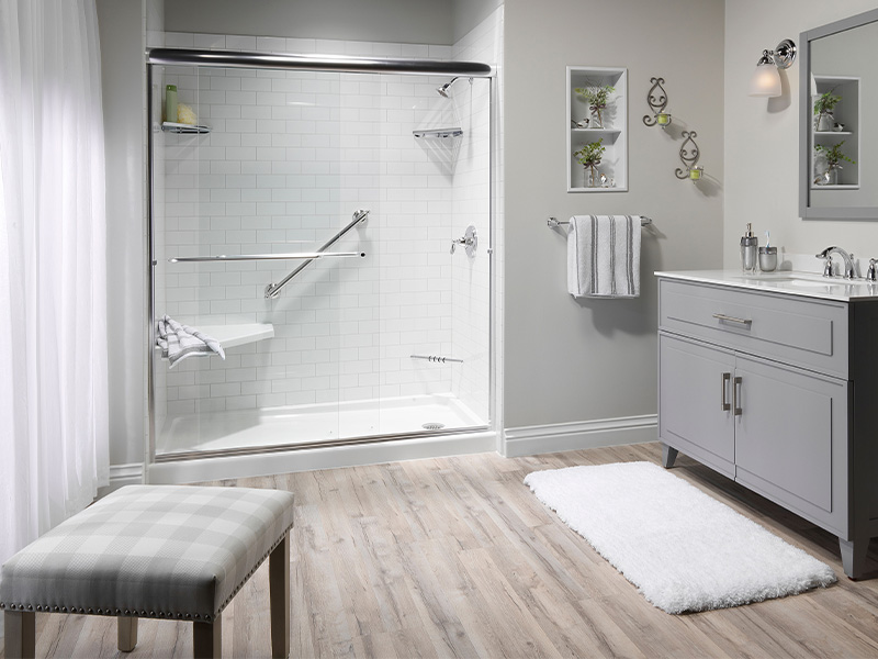 Light gray bathroom with tub shower combo